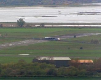 The train to Derry crossing the Ballykelly runway