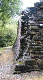 A sloping wall next to the river