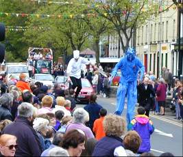 Two people on stilts