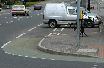 A cycle path blocked by a car