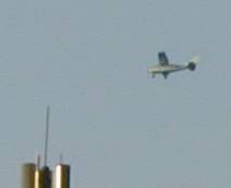 A white and very noisy plane