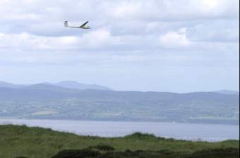 A glider above Benevenagh Mountain