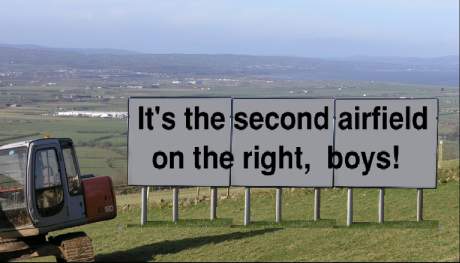 A huge sign warning pilots to pick the right air
                field