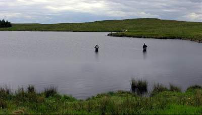 Two half anglers in lake Benevenagh in the Roe Valley